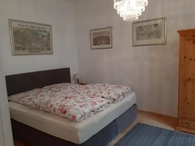 Ein Bett oder Betten in einem Zimmer der Unterkunft Ferienwohnung Am Nauener Tor