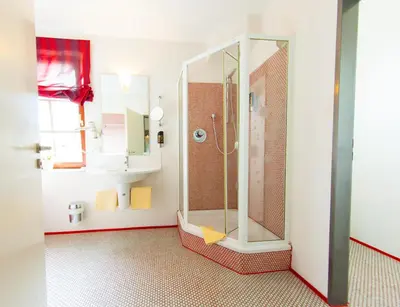 Ein Badezimmer in der Unterkunft Garni-Hotel An der Weide