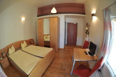Ein Bett oder Betten in einem Zimmer der Unterkunft Hof Märkische Heide