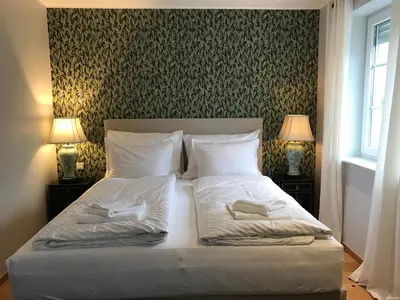 Ein Bett oder Betten in einem Zimmer der Unterkunft Alwine - Landhaus an den Spreewiesen