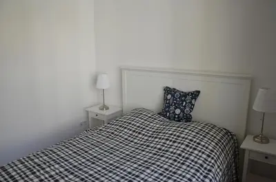 Ein Bett oder Betten in einem Zimmer der Unterkunft BerlinBerlin