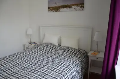 Ein Bett oder Betten in einem Zimmer der Unterkunft BerlinBerlin