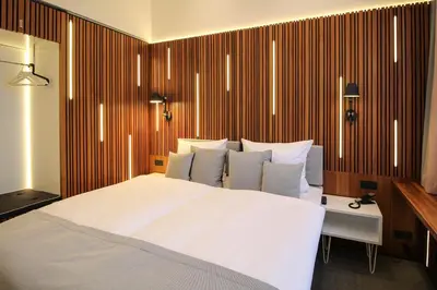Ein Bett oder Betten in einem Zimmer der Unterkunft H24 Berlin Lichtenberg