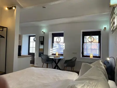 Ein Bett oder Betten in einem Zimmer der Unterkunft Spreewaldapartments-Kossatz