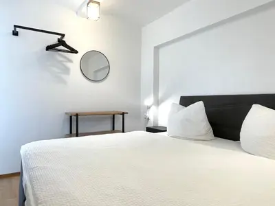 Ein Bett oder Betten in einem Zimmer der Unterkunft Spreewaldapartments-Kossatz