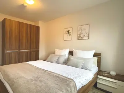 Ein Bett oder Betten in einem Zimmer der Unterkunft Spreewaldapartments-Kossatz