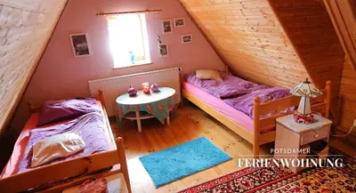 Ein Bett oder Betten in einem Zimmer der Unterkunft Potsdamer Ferienwohnung