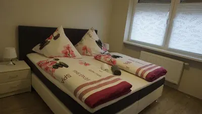 Ein Bett oder Betten in einem Zimmer der Unterkunft Ferienwohnung Kaiser Lübben