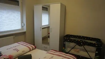 Ein Bett oder Betten in einem Zimmer der Unterkunft Ferienwohnung Kaiser Lübben