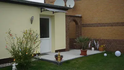 Ein Garten an der Unterkunft Ferienwohnung Kaiser Lübben
