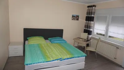Ein Bett oder Betten in einem Zimmer der Unterkunft Ferienwohnung Kaiser Lübben