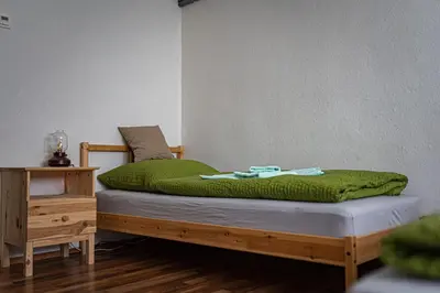Ein Bett oder Betten in einem Zimmer der Unterkunft Zimmervermietung Familie Schuster