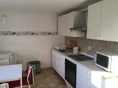 Küche/Küchenzeile in der Unterkunft Zimmervermietung Familie Schuster