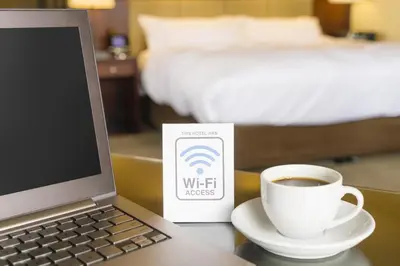 Ein Bett oder Betten in einem Zimmer der Unterkunft TRIO Apartment Hotel Berlin