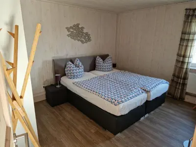 Ein Bett oder Betten in einem Zimmer der Unterkunft Haus Renate