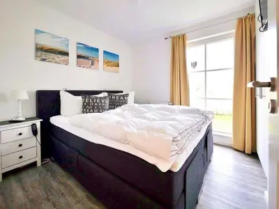 Ein Bett oder Betten in einem Zimmer der Unterkunft Ferienpark Scharmützelsee