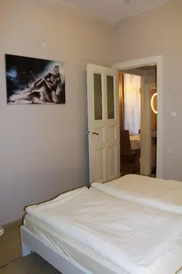Ein Bett oder Betten in einem Zimmer der Unterkunft Stars Berlin Apartments Essener Straße
