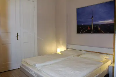 Ein Bett oder Betten in einem Zimmer der Unterkunft Stars Berlin Apartments Essener Straße