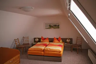 Ein Bett oder Betten in einem Zimmer der Unterkunft Ferienwohnung Gliese