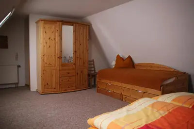 Ein Bett oder Betten in einem Zimmer der Unterkunft Ferienwohnung Gliese