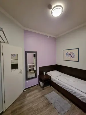 Ein Bett oder Betten in einem Zimmer der Unterkunft Albert rooms