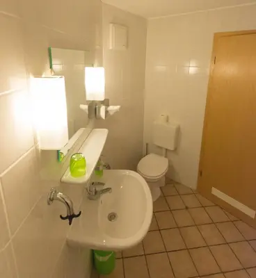 Ein Badezimmer in der Unterkunft 