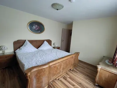 Ein Bett oder Betten in einem Zimmer der Unterkunft Ferienwohnungen Amselweg