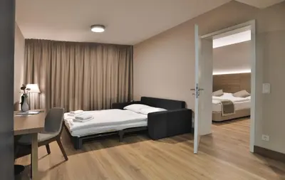 Ein Bett oder Betten in einem Zimmer der Unterkunft Ocak Aparthotel