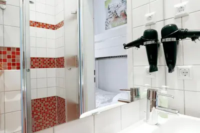 Ein Badezimmer in der Unterkunft NIEB by ROCKCHAIR Apartments l SUPERHOST Status l 3 Bedrooms Boxspringbeds 3 Bathrooms in Center 
