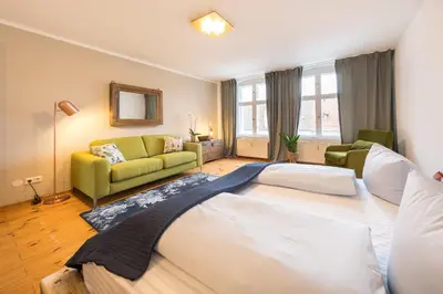 Ein Bett oder Betten in einem Zimmer der Unterkunft Design Apartments - 