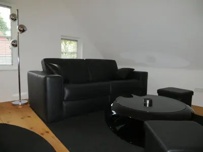 Ein Sitzbereich in der Unterkunft Fischerhaus am See