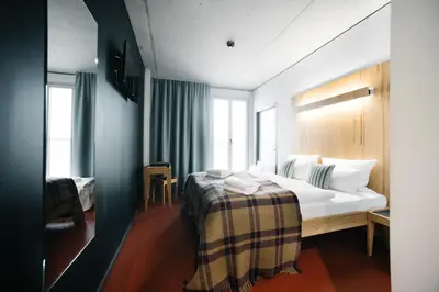 Ein Bett oder Betten in einem Zimmer der Unterkunft Hotel Rossi
