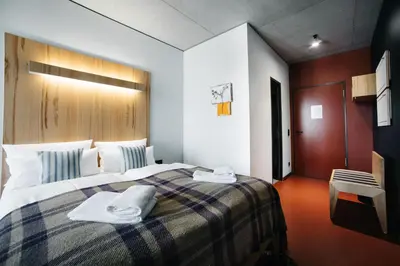 Ein Bett oder Betten in einem Zimmer der Unterkunft Hotel Rossi