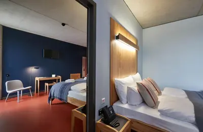 Ein Bett oder Betten in einem Zimmer der Unterkunft Hotel Rossi