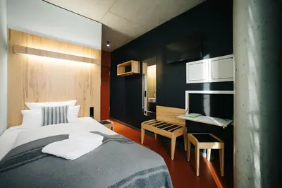 Ein Bett oder Betten in einem Zimmer der Unterkunft Hotel Rossi