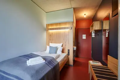 Ein Bett oder Betten in einem Zimmer der Unterkunft Hotel Rossi