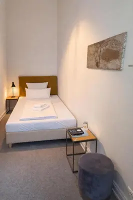 Ein Bett oder Betten in einem Zimmer der Unterkunft Romantik Hotel Schloss Reichenow