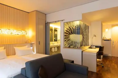 Ein Bett oder Betten in einem Zimmer der Unterkunft Scandic Berlin Potsdamer Platz