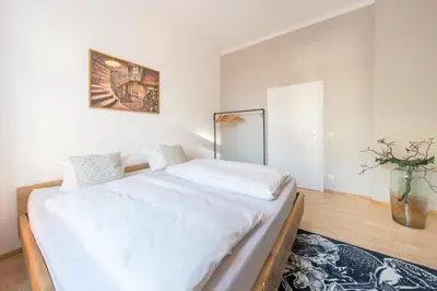 Ein Bett oder Betten in einem Zimmer der Unterkunft Design Apartments - 