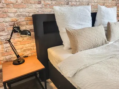 Ein Bett oder Betten in einem Zimmer der Unterkunft Ferienwohnung Backstube