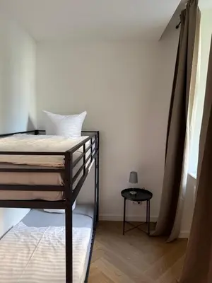 Ein Bett oder Betten in einem Zimmer der Unterkunft Pension Marie Prenzlauer Berg