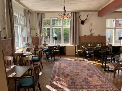 Ein Sitzbereich in der Unterkunft Bahnhofshotel Die Neue Bühne