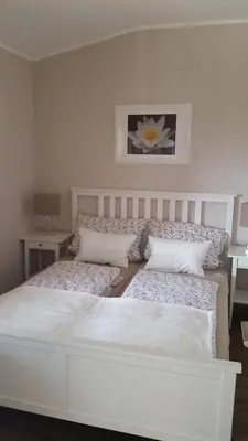 Ein Bett oder Betten in einem Zimmer der Unterkunft Ferienwohnungen Dirk Laurisch