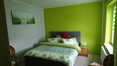 Ein Bett oder Betten in einem Zimmer der Unterkunft Restaurant Rosengarten