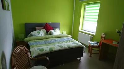 Ein Bett oder Betten in einem Zimmer der Unterkunft Restaurant Rosengarten