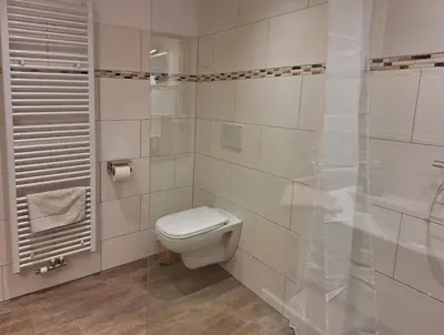 Ein Badezimmer in der Unterkunft Kulturfreizeiten Ferienwohnungen