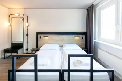 Ein Bett oder Betten in einem Zimmer der Unterkunft a&o Berlin Hauptbahnhof