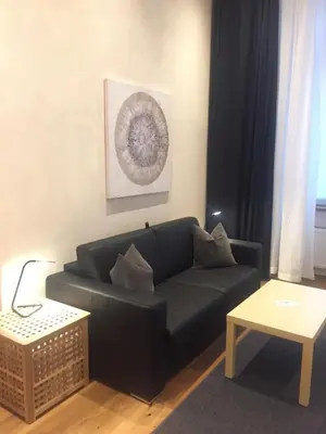 Ein Sitzbereich in der Unterkunft City-Apartment Berlin Charlottenburg