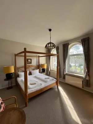 Ein Bett oder Betten in einem Zimmer der Unterkunft Hotel & Restaurant Raueneck