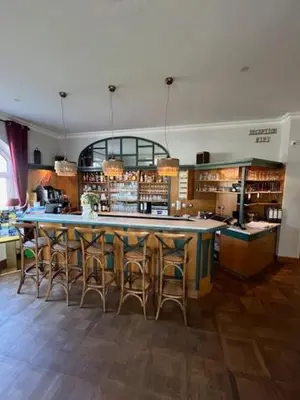 Ein Restaurant oder anderes Speiselokal in der Unterkunft Hotel & Restaurant Raueneck
